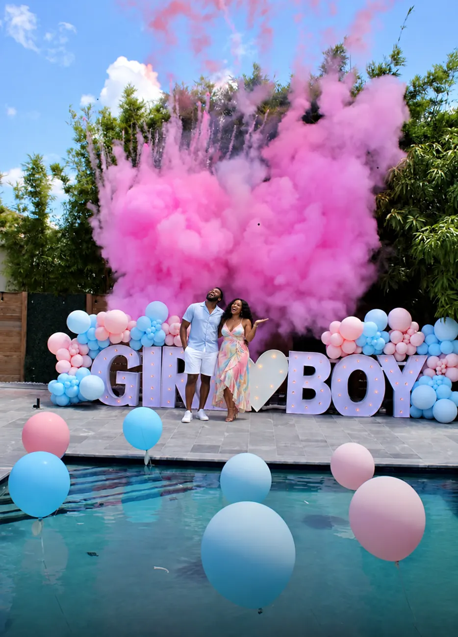 Boy or Girl gender reveal balloon backdrop with pink and blue balloons and marquee GIRL BOY letters in Miami